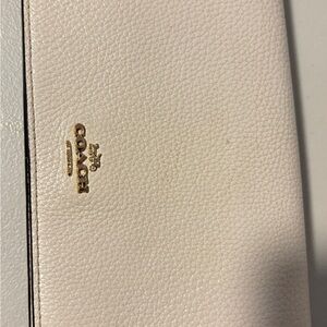 Coach Cream Pebble Leather Clutch with Gold Logo